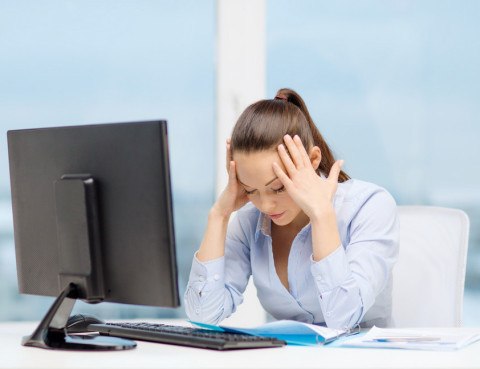 photodune-7064563-stressed-woman-with-computer-and-documents-s