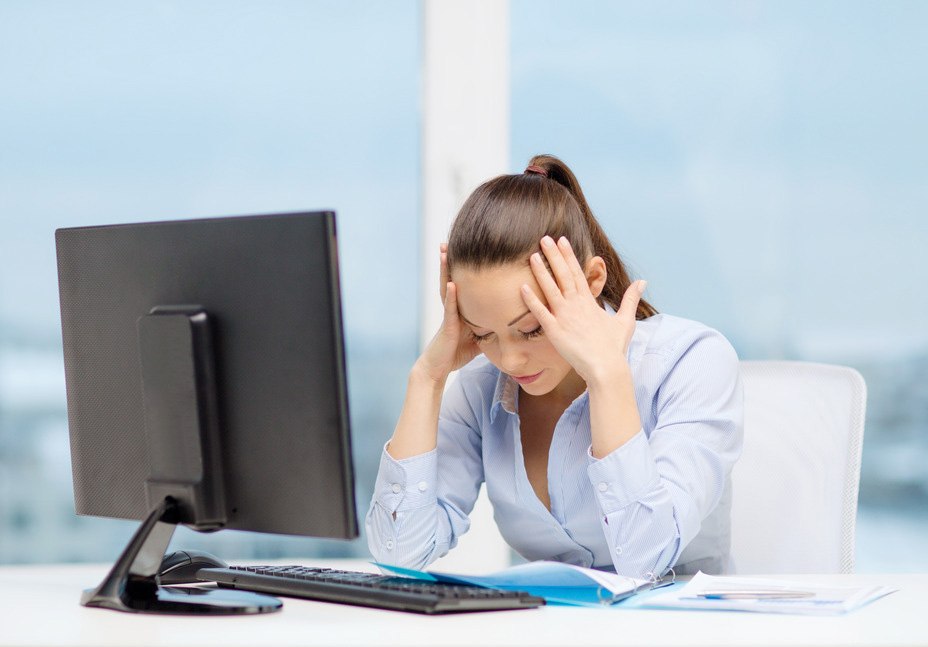 photodune-7064563-stressed-woman-with-computer-and-documents-s